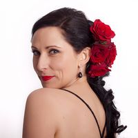 Libby Hammer with red roses in her hair Libby Hammer with red roses in her hair